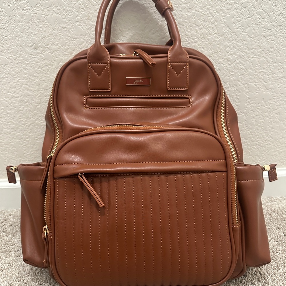 Jujube Million Pocket Faux Leather Backpack
